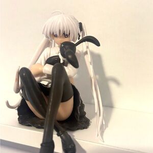 Anime Character Figurine with Black and White Accents